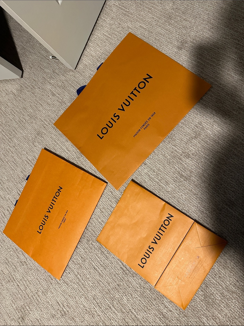 3 LV shopping bags